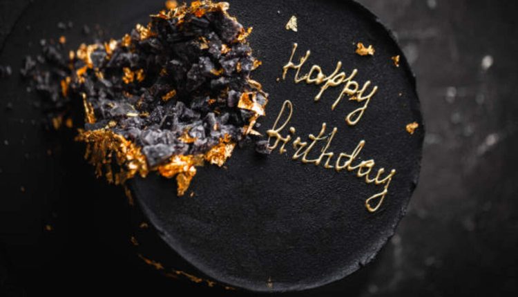 Black and Gold Drip Cake